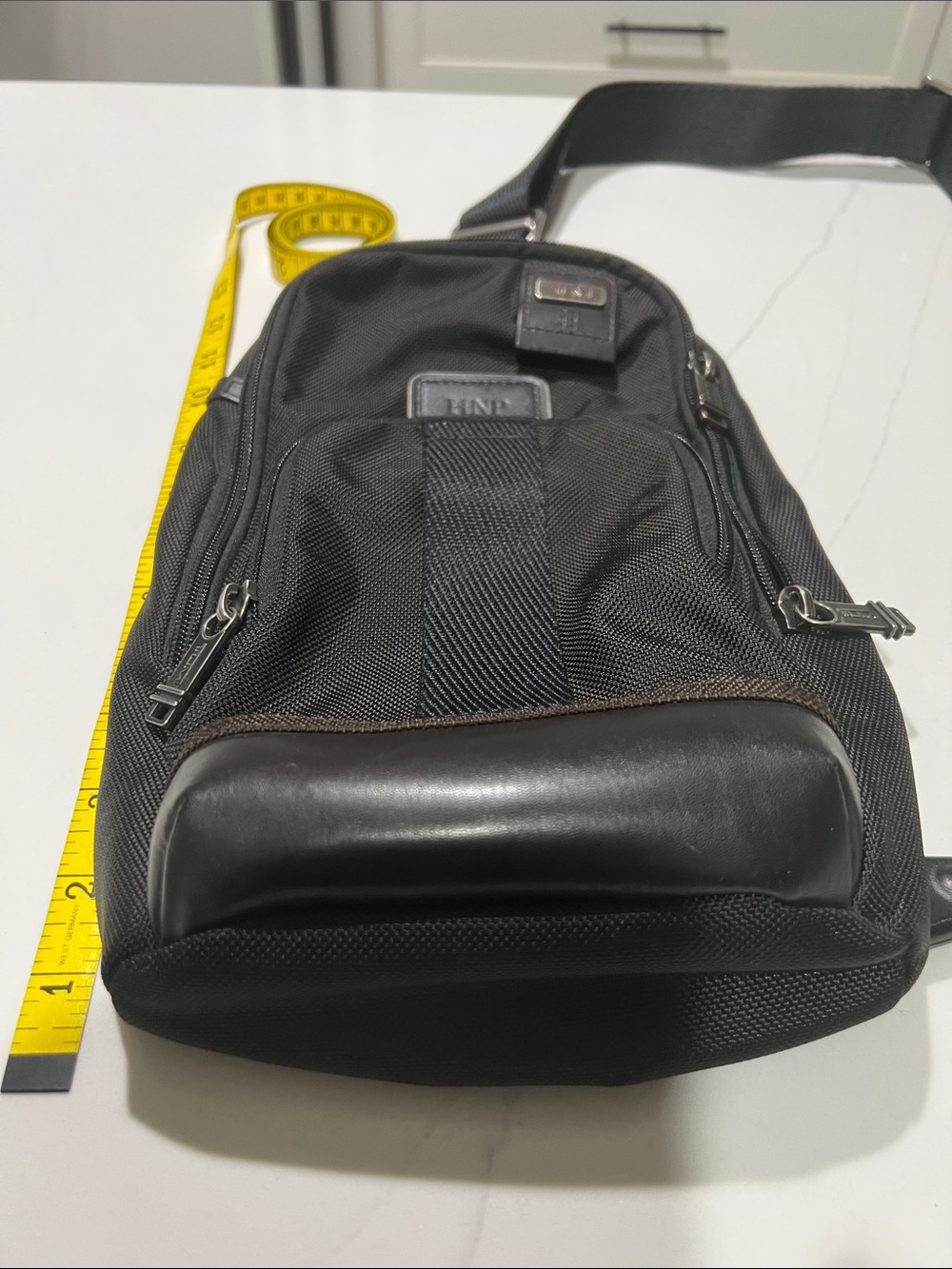 Tumi Black Crossbody Sling Compact Everyday Carry, great condition.
